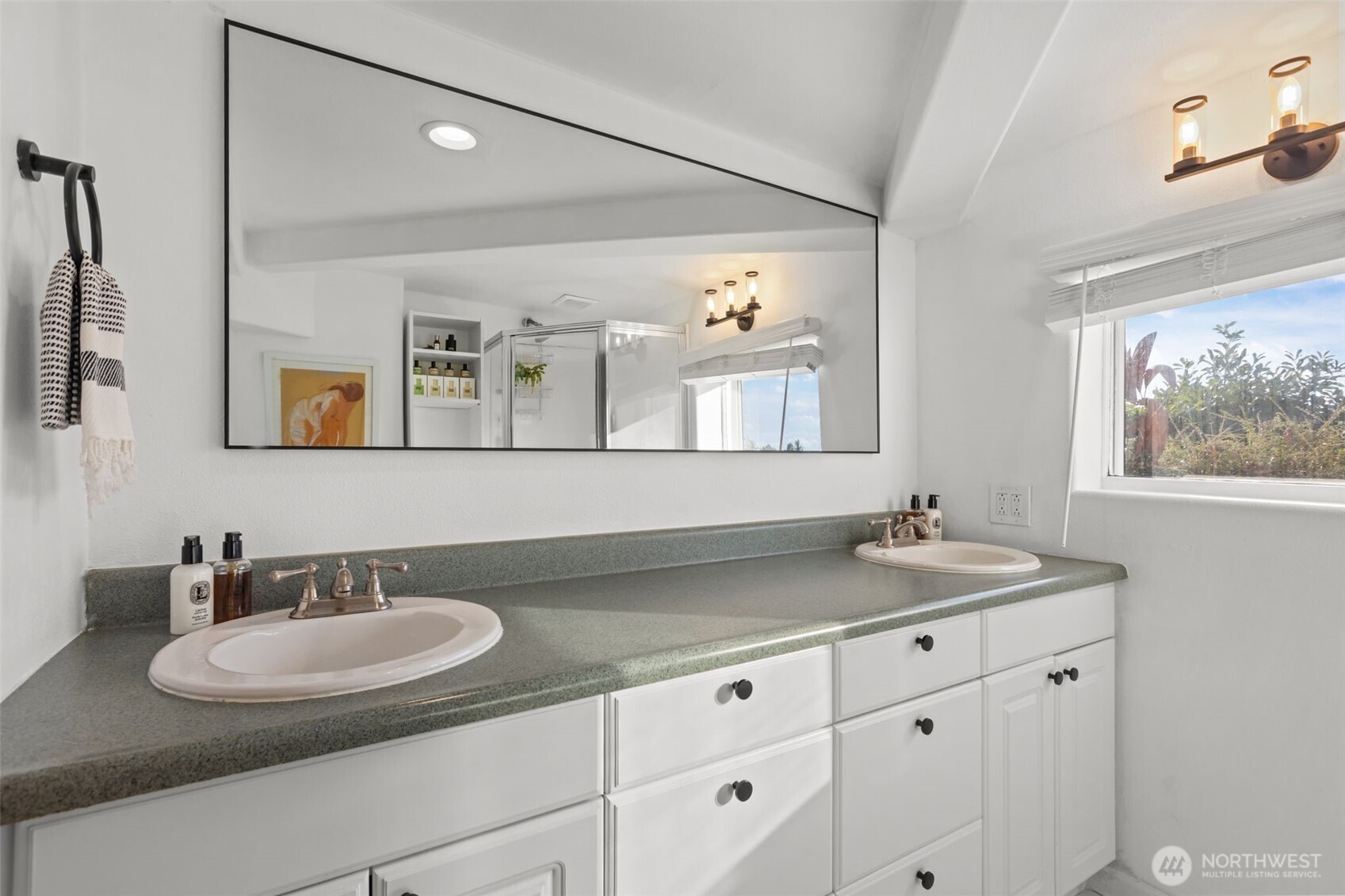 4411 Southwest Othello Street Seattle, WA 98136 - Photo 19 of 36 a bathroom with a granite countertop sink and a mirror