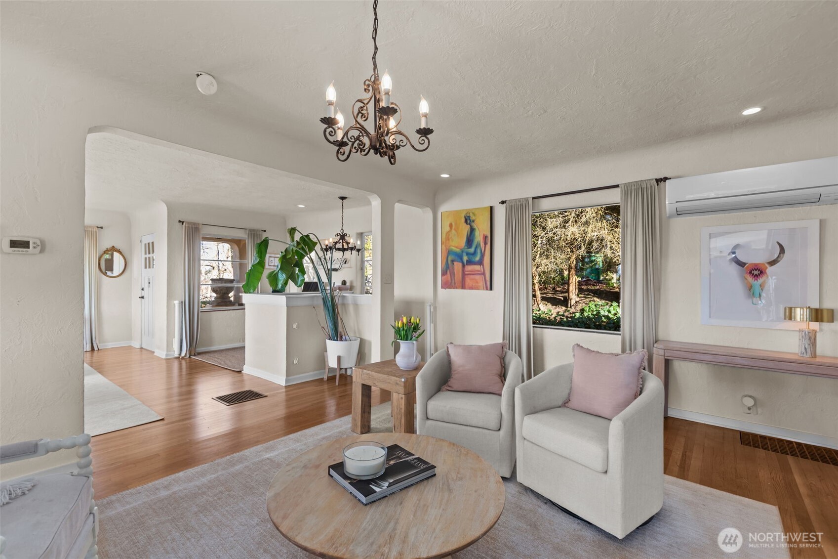 4411 Southwest Othello Street Seattle, WA 98136 - Photo 10 of 36 a living room with furniture and a chandelier