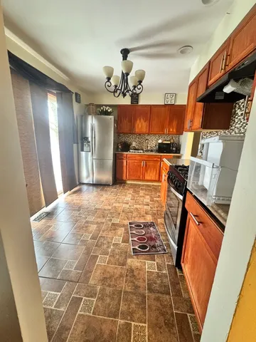 a view of a kitchen with a sink