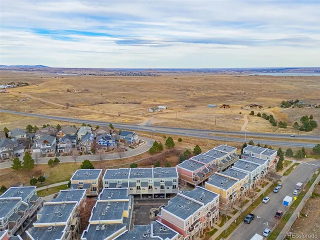 an aerial view of residential house with an ocean