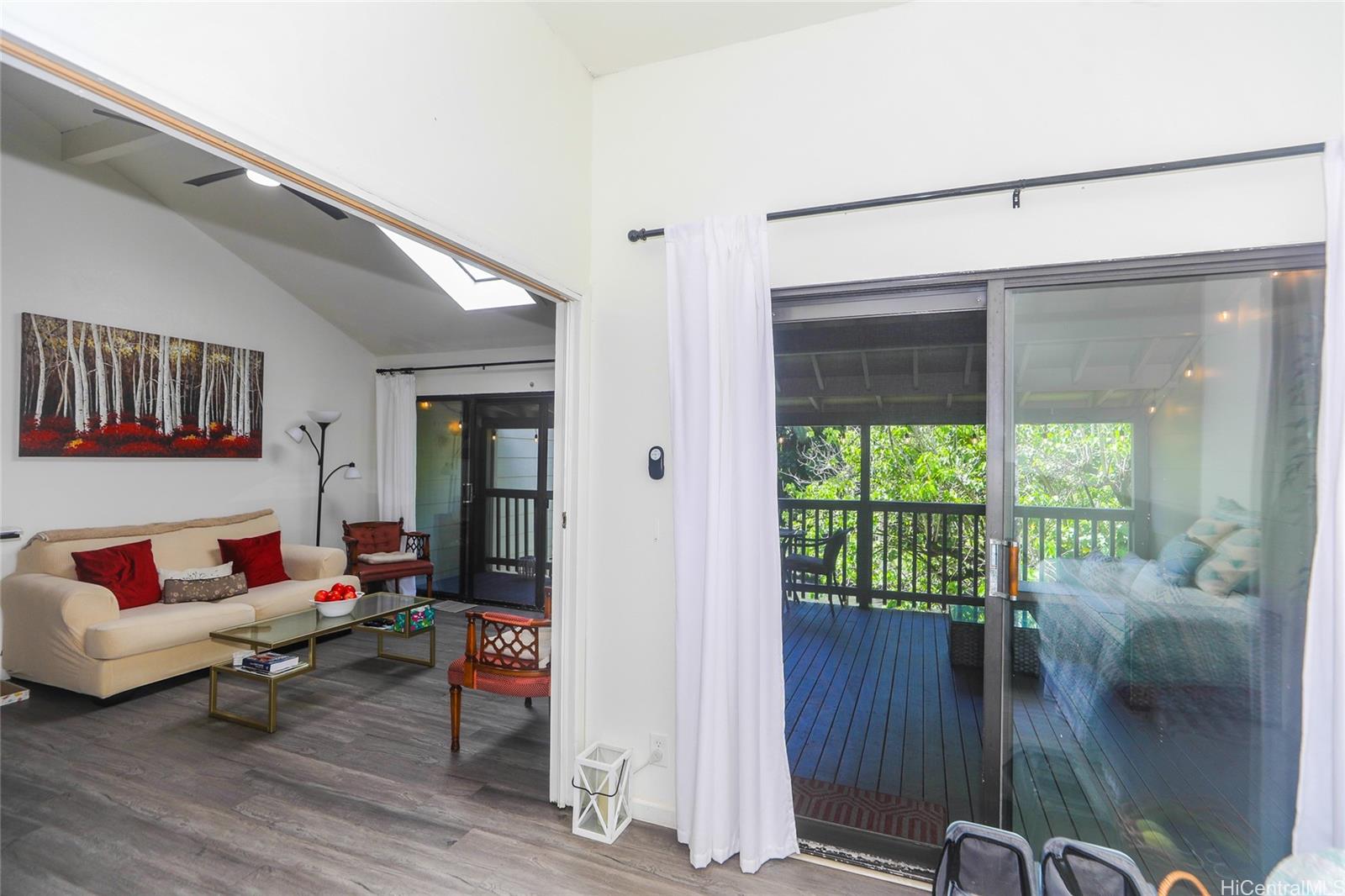 45-995 Wailele Road, Unit 8 Kaneohe, HI 96744 - Photo 10 of 25 stnding in the 2nd bedroom and looking out towards the living area and lanai.