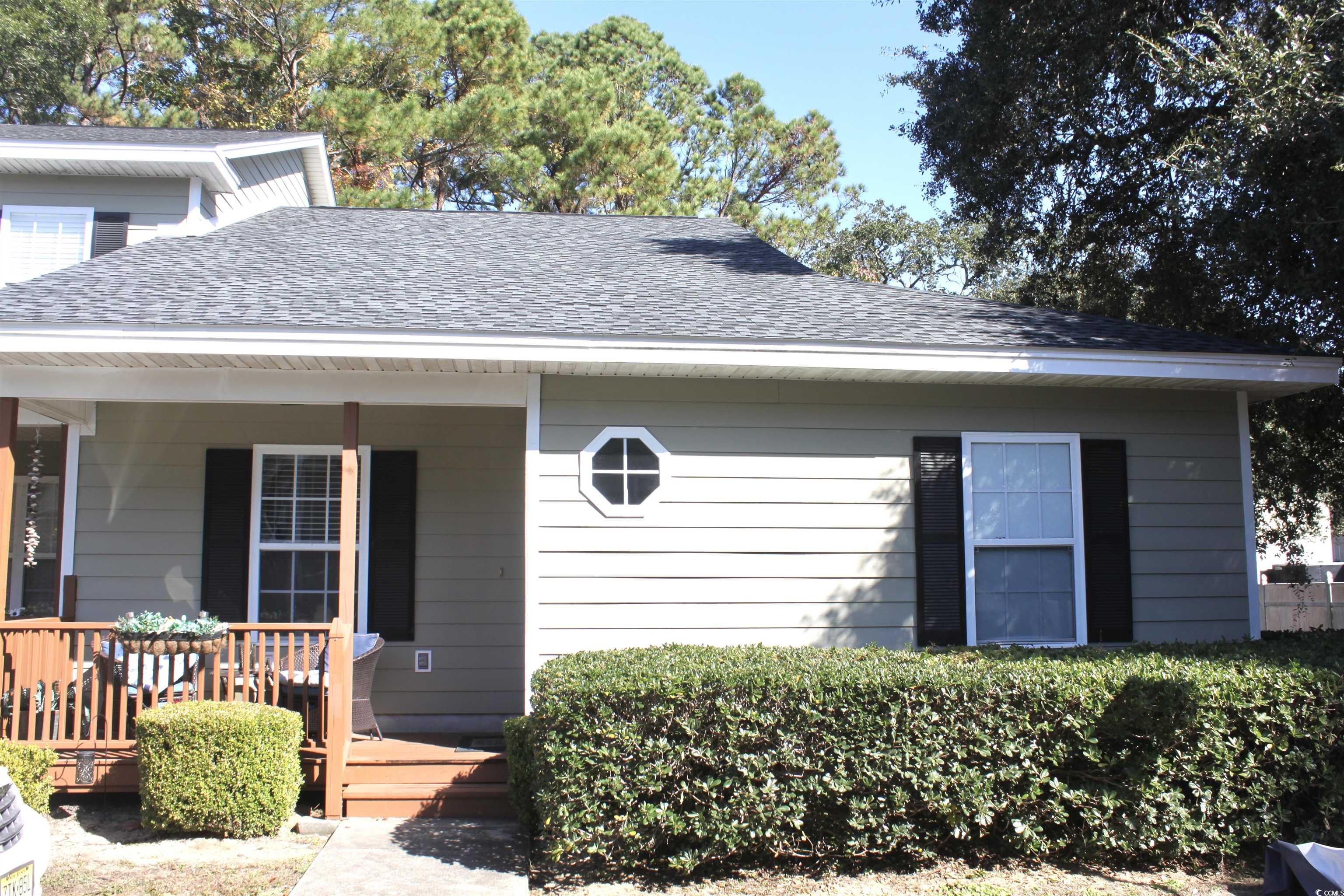 4840 Moss Creek Loop, Unit 36 Murrells Inlet, SC 29576 - Photo 1 of 37 View of front of property with covered porch and a shingled roof