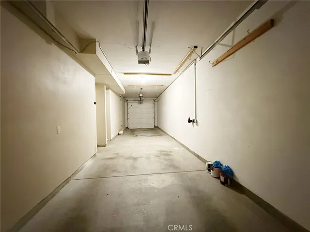 a view of a room with lots of garage and window