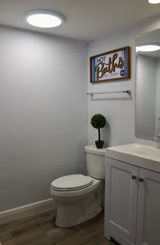 a bathroom with a toilet and a sink