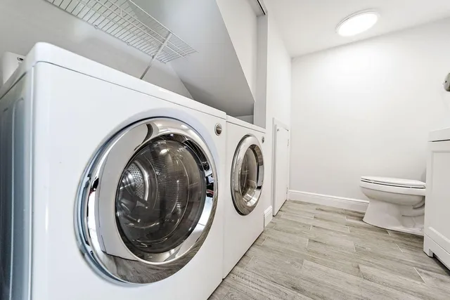 a view of washer and dryer in a utility room