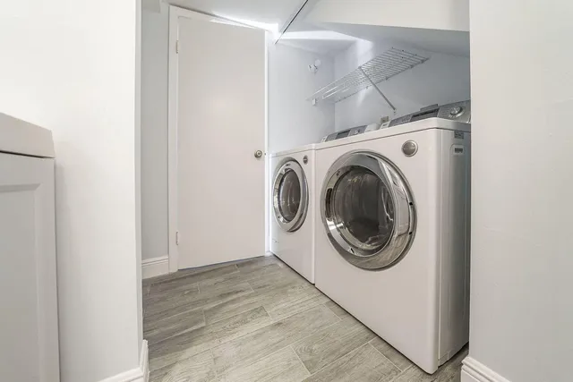 a utility room with dryer and washer