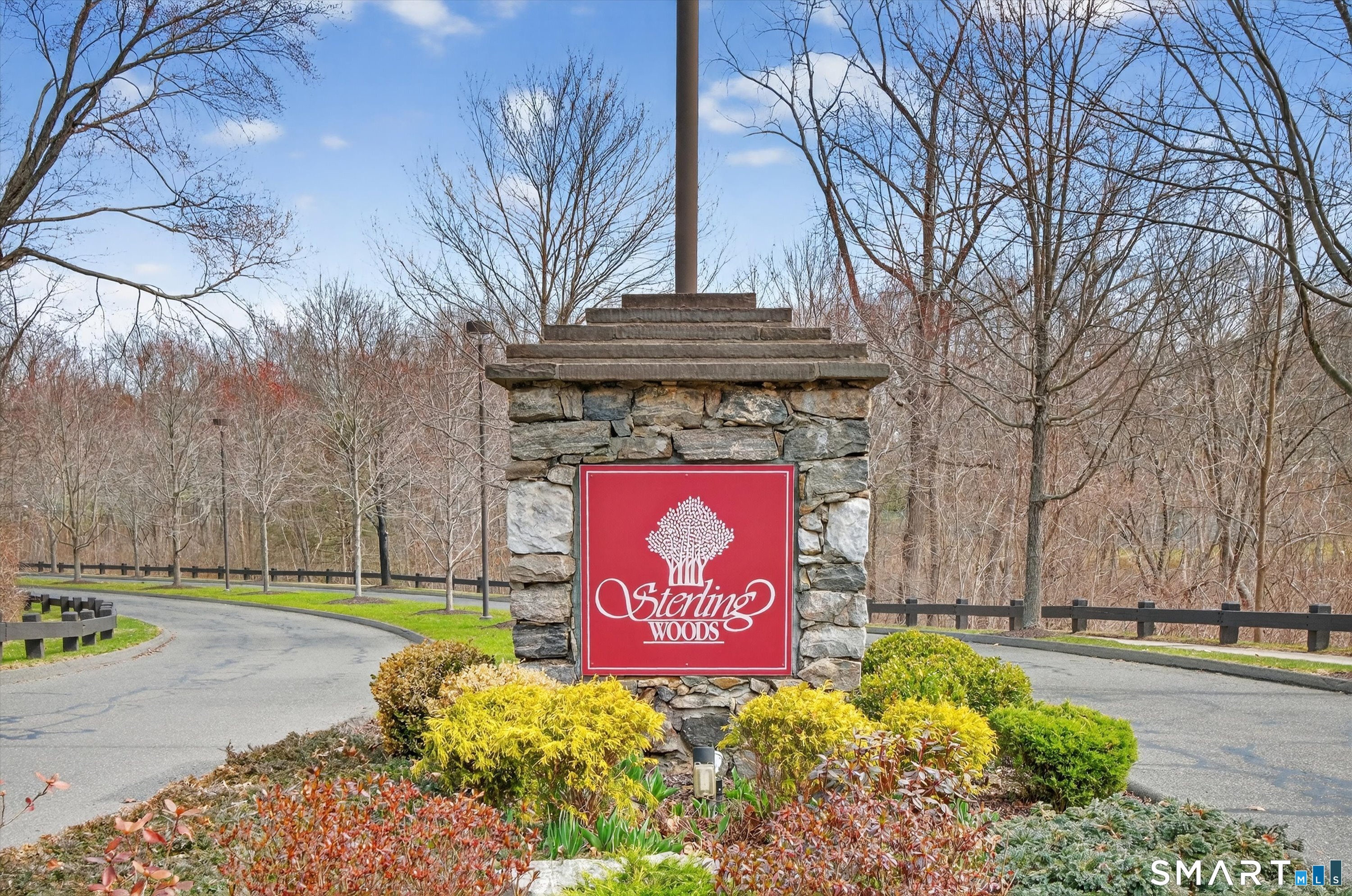 1502 Pinnacle Way, Unit 1502 Danbury, CT 06811 - Photo 3 of 45 a sign that is sitting in front of a house