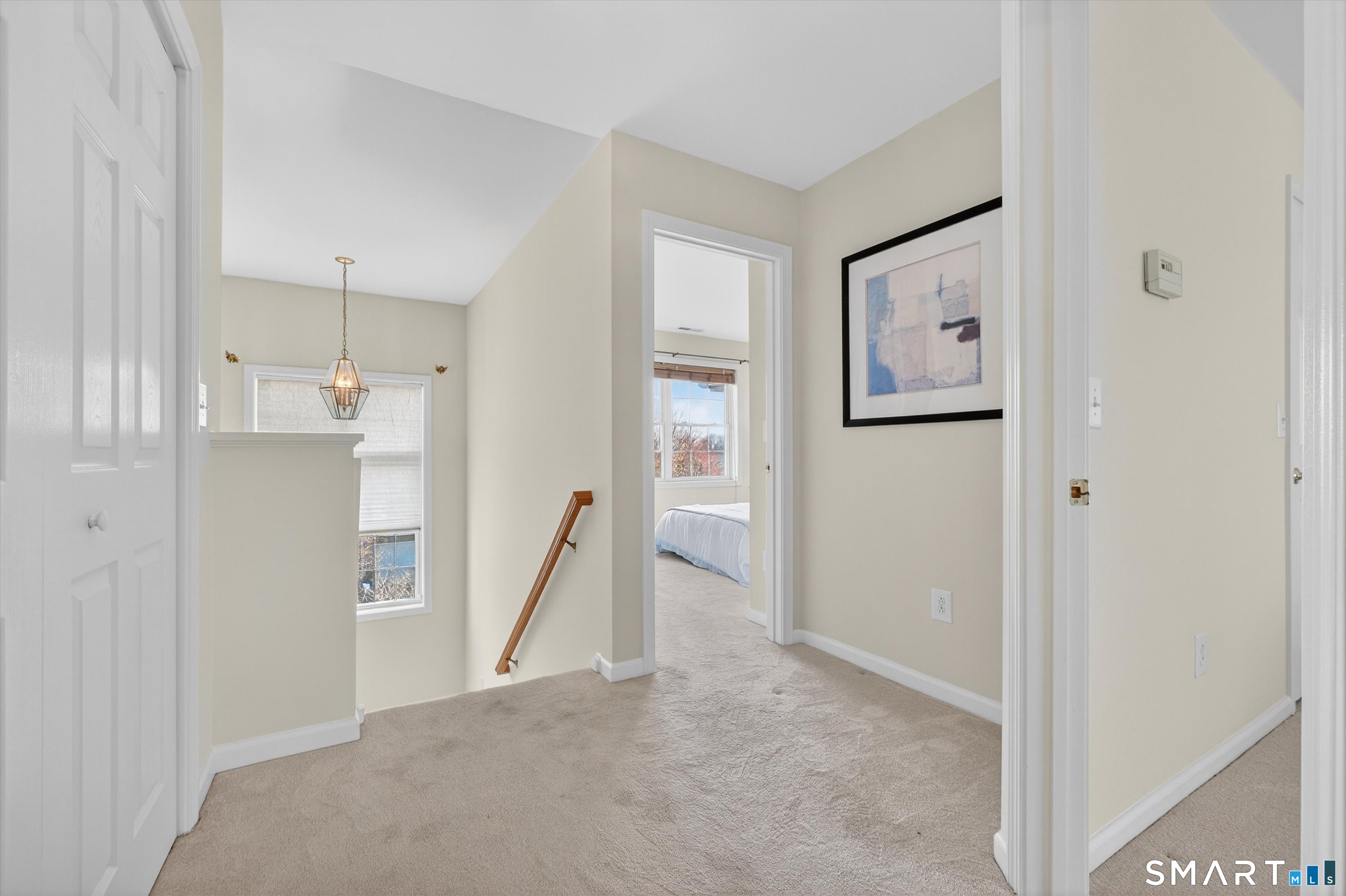 1502 Pinnacle Way, Unit 1502 Danbury, CT 06811 - Photo 33 of 45 a view of a hallway with closet