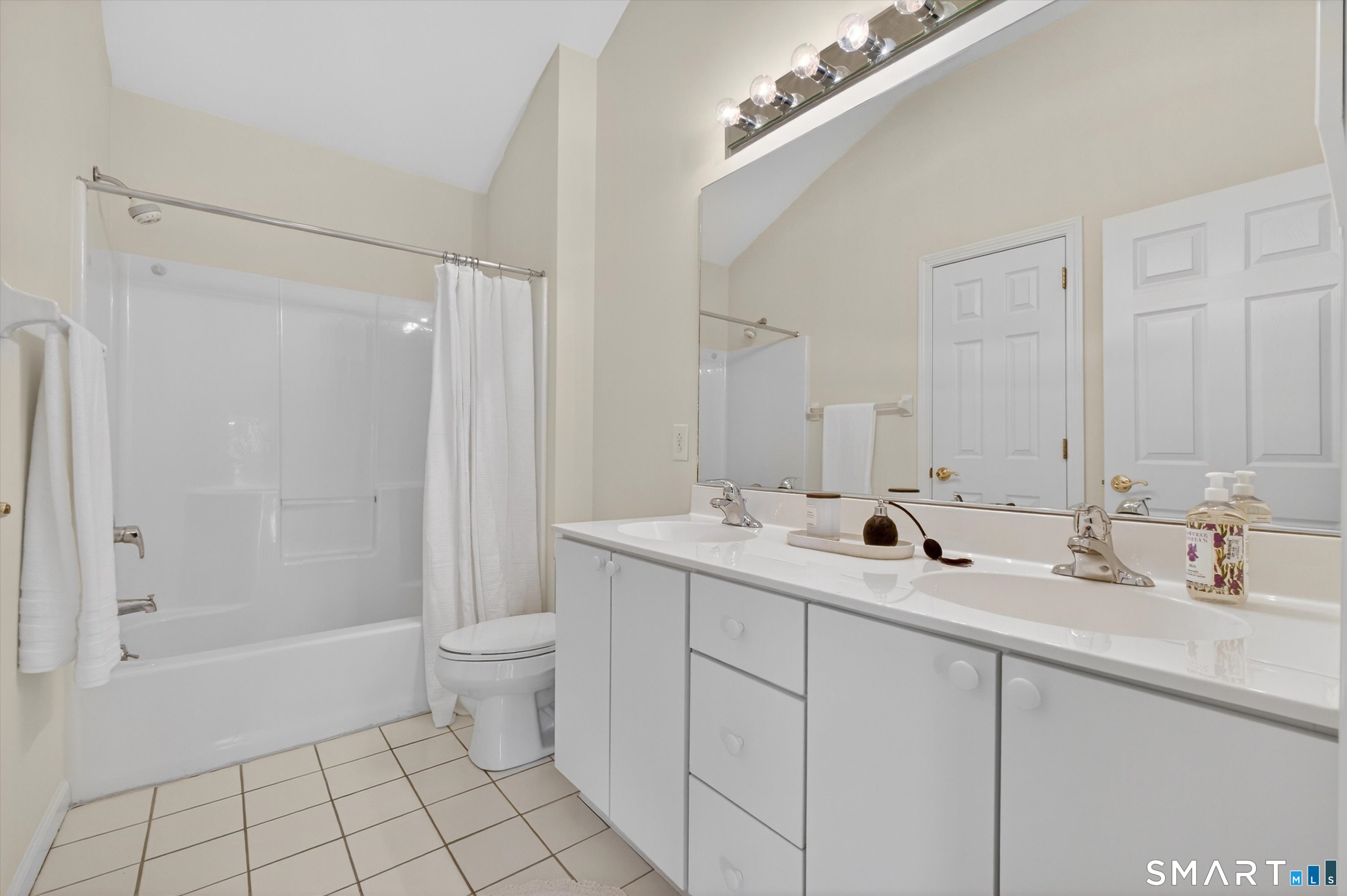 1502 Pinnacle Way, Unit 1502 Danbury, CT 06811 - Photo 41 of 45 a bathroom with a double vanity sink mirror and toilet