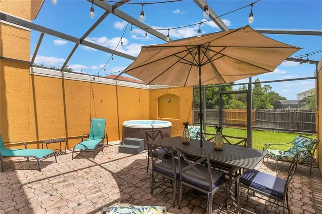 a view of an outdoor sitting area with furniture