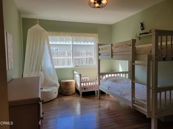 a bedroom with a bed and a walk in closet