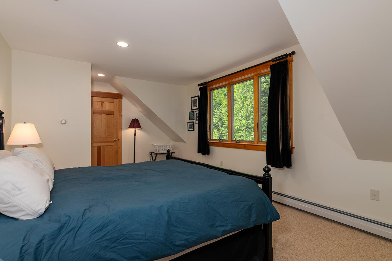 7022 Hardwood Ridge Road, Unit 7022 Kingfield, ME 04947 - Photo 26 of 31 Master Bedroom
