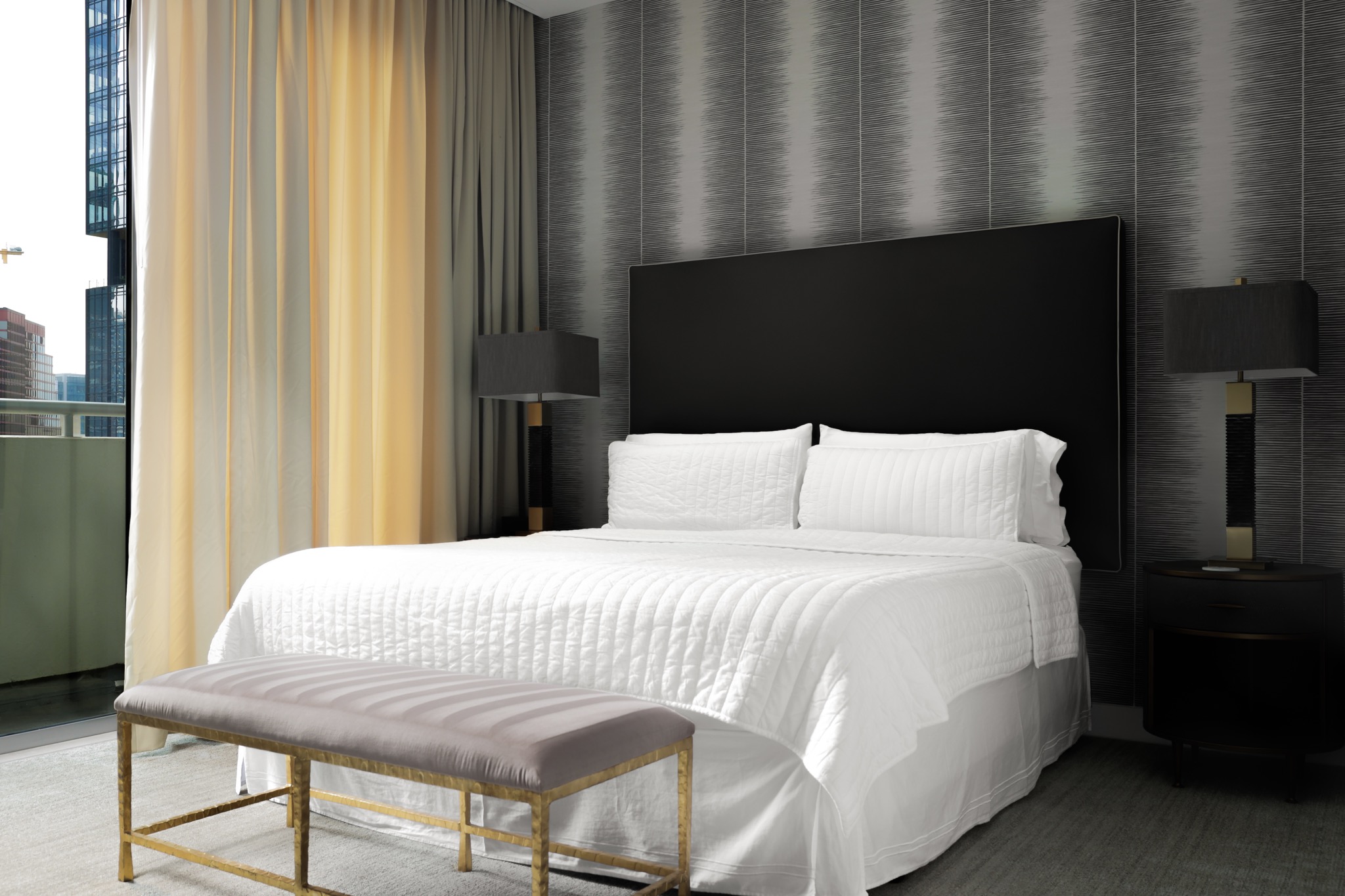 200 Congress Avenue, Unit 24E Austin, TX 78701 - Photo 30 of 40 a bedroom with a bed and a window