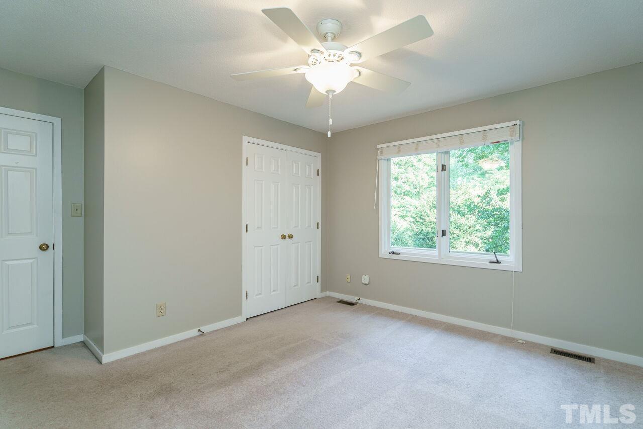 12213 Galway Drive Raleigh, NC 27613 - Photo 17 of 31 a view of an empty room with a window