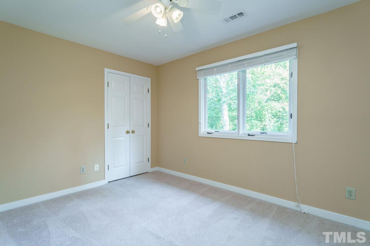 12213 Galway Drive Raleigh, NC 27613 - Photo 24 of 31 a view of an empty room with a window