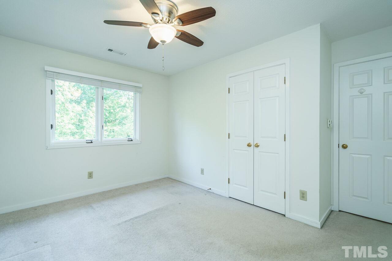 12213 Galway Drive Raleigh, NC 27613 - Photo 26 of 31 a view of an empty room with a window