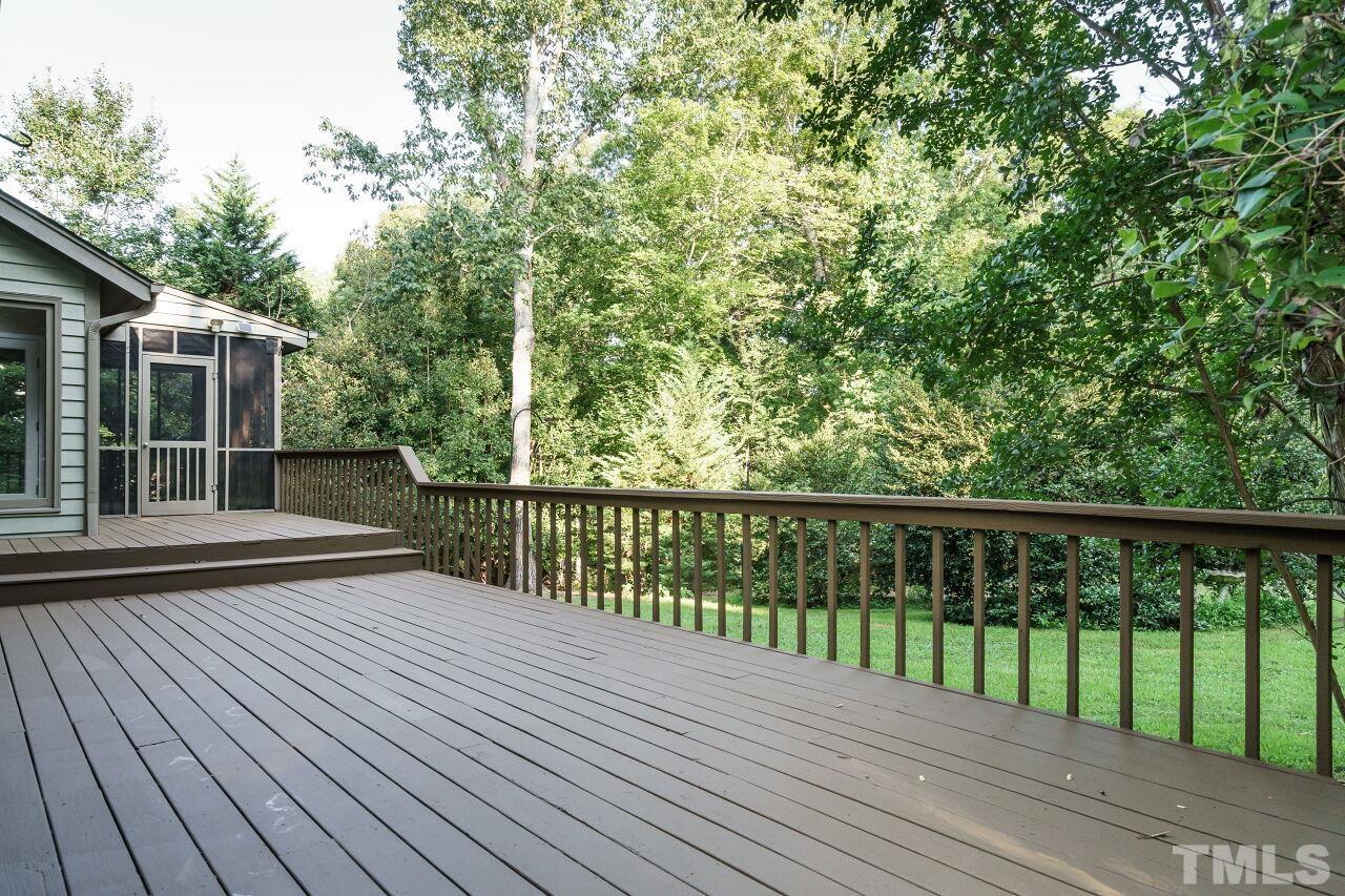 12213 Galway Drive Raleigh, NC 27613 - Photo 28 of 31 a view of balcony with wooden floor