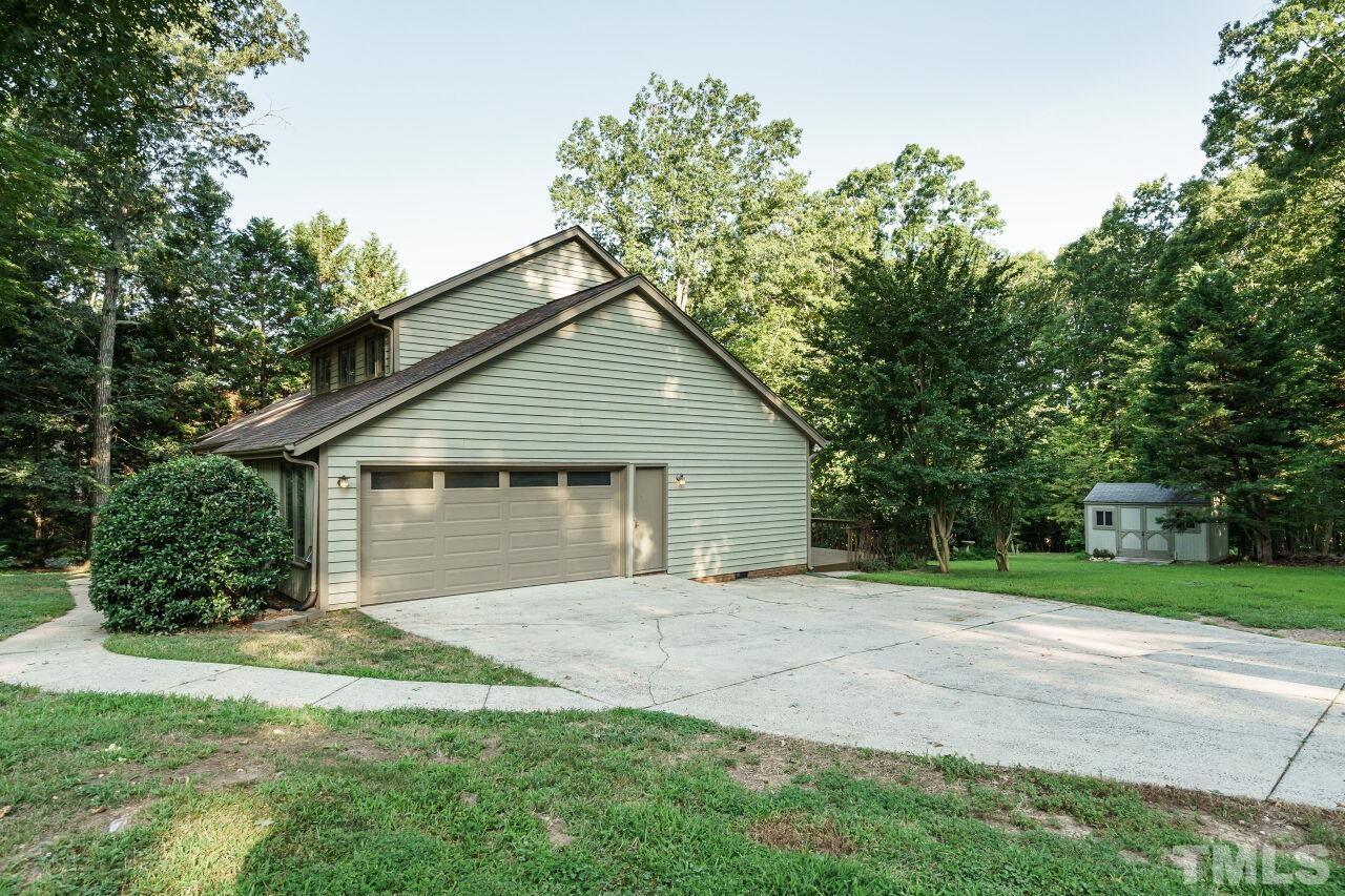 12213 Galway Drive Raleigh, NC 27613 - Photo 31 of 31 a front view of house with yard and green space