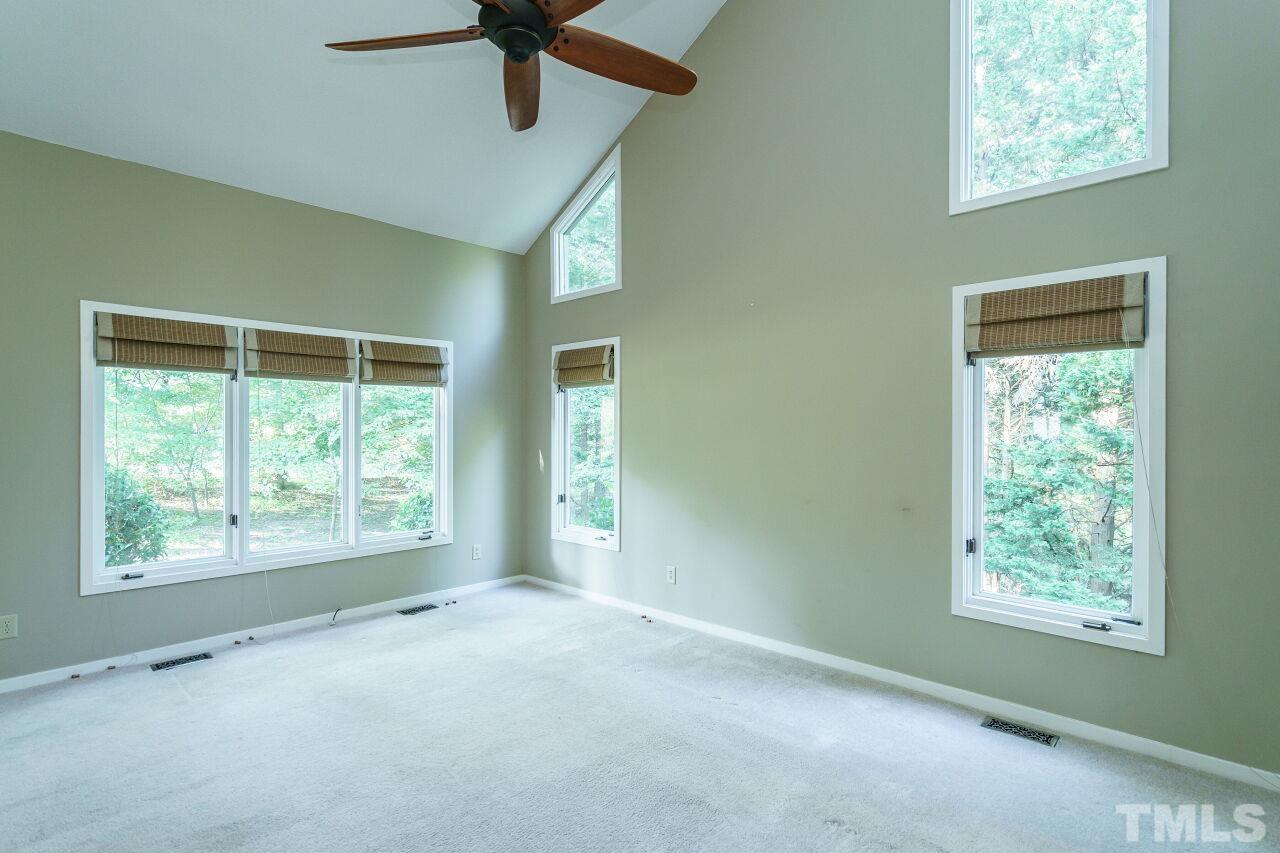 12213 Galway Drive Raleigh, NC 27613 - Photo 6 of 31 a view of an empty room with a window