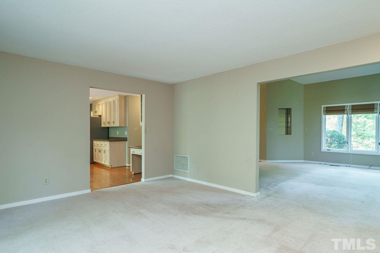 12213 Galway Drive Raleigh, NC 27613 - Photo 9 of 31 an empty room with windows and closet