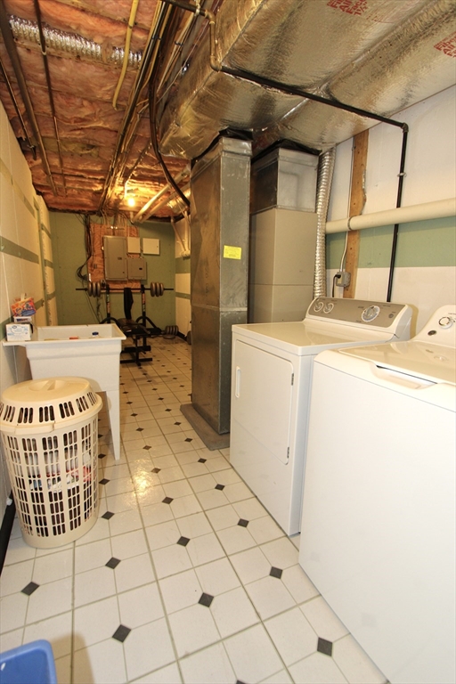 159 Mower Street Worcester, MA 01602 - Photo 23 of 27 a utility room with dryer and washer