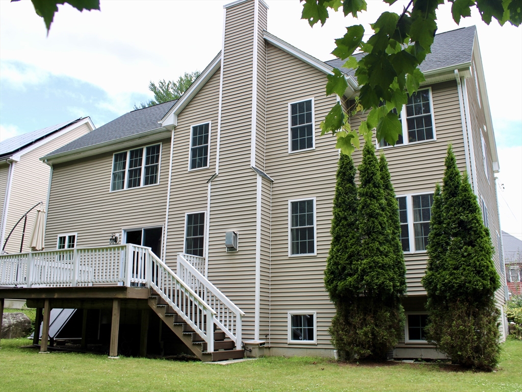 159 Mower Street Worcester, MA 01602 - Photo 26 of 27 a view of a house with a yard