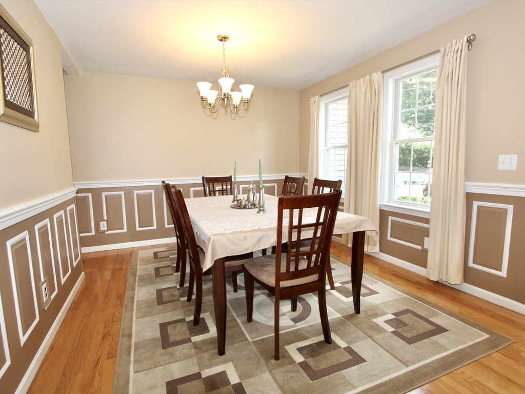 159 Mower Street Worcester, MA 01602 - Photo 3 of 27 a view of a dining room with furniture window and wooden floor