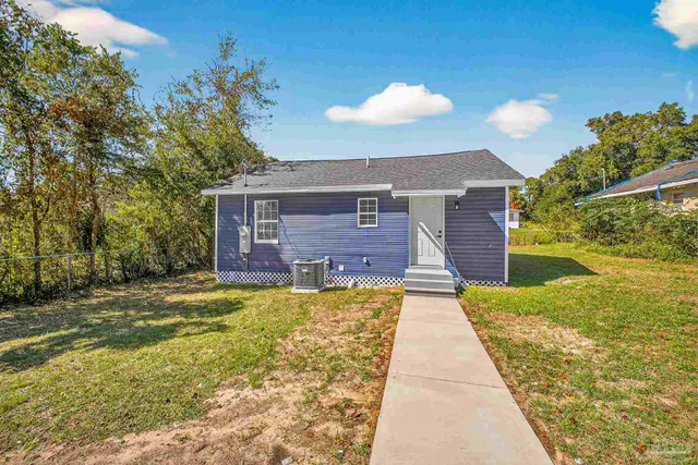 a view of a house with a patio