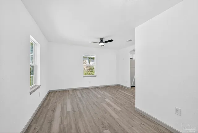 an empty room with windows