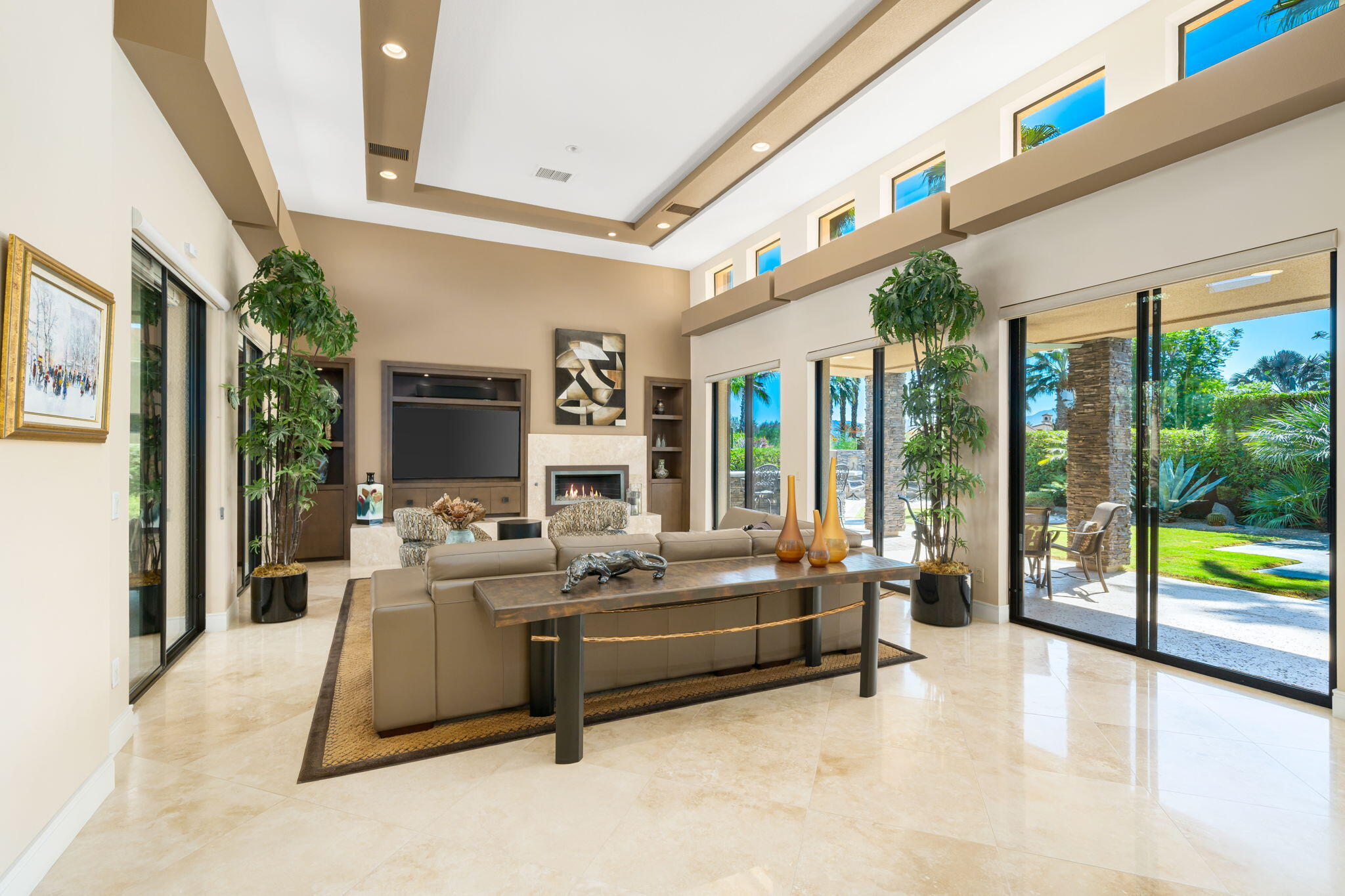 14 Dominion Court Rancho Mirage, CA 92270 - Photo 19 of 65 a living room with furniture and a large window