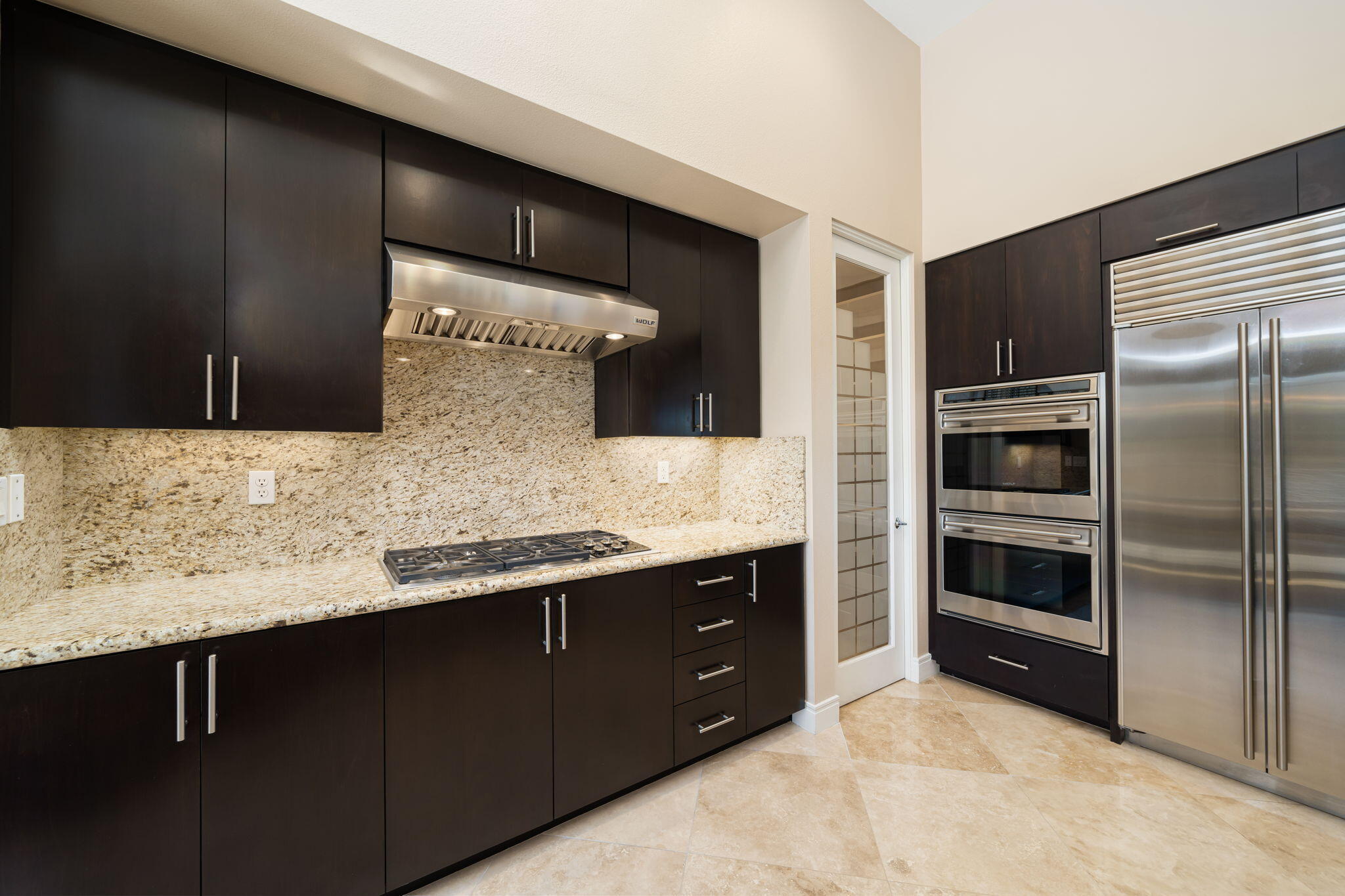 14 Dominion Court Rancho Mirage, CA 92270 - Photo 27 of 65 a bathroom with a sink and a large mirror