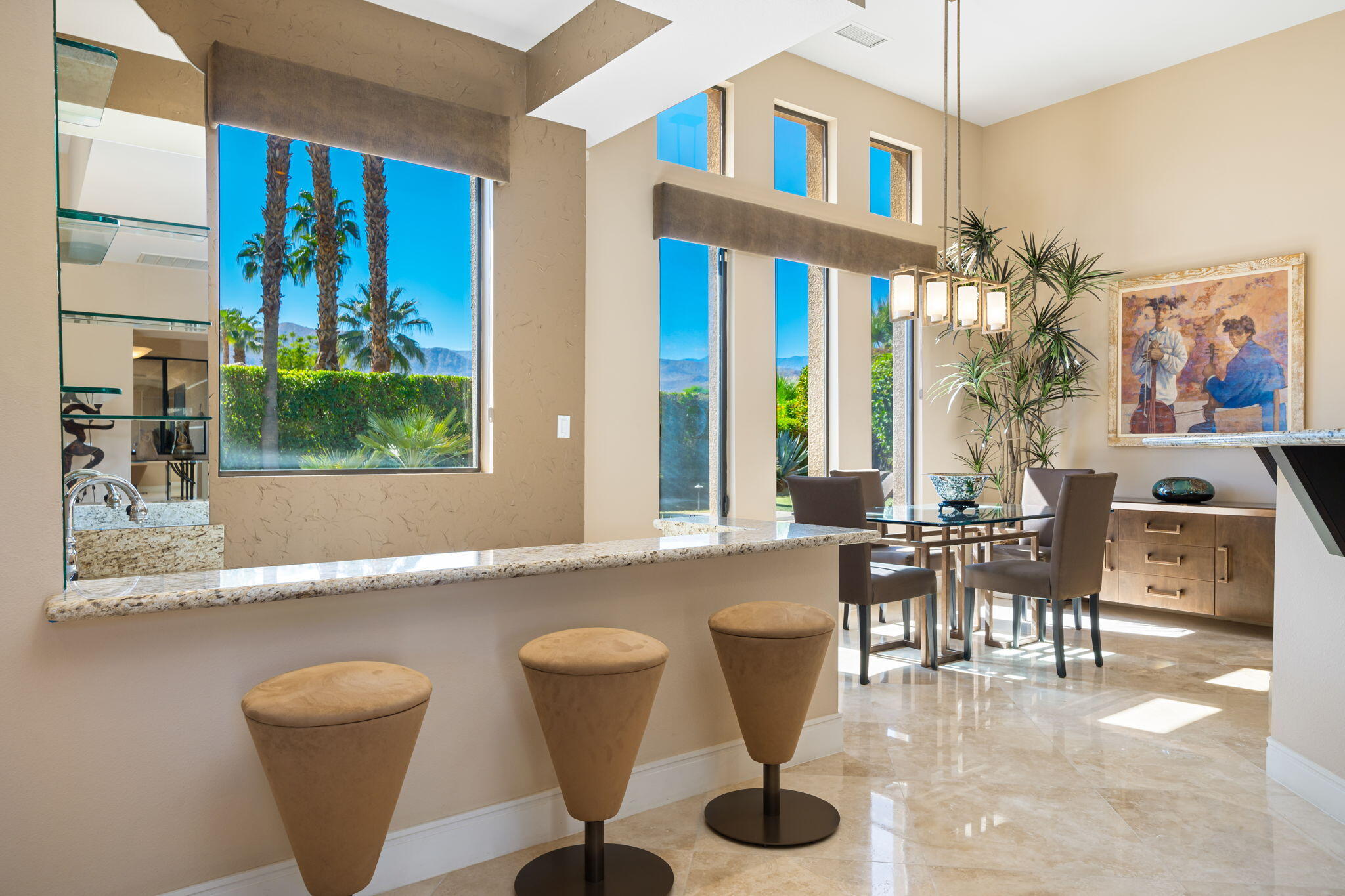 14 Dominion Court Rancho Mirage, CA 92270 - Photo 29 of 65 a living room with furniture and a large window