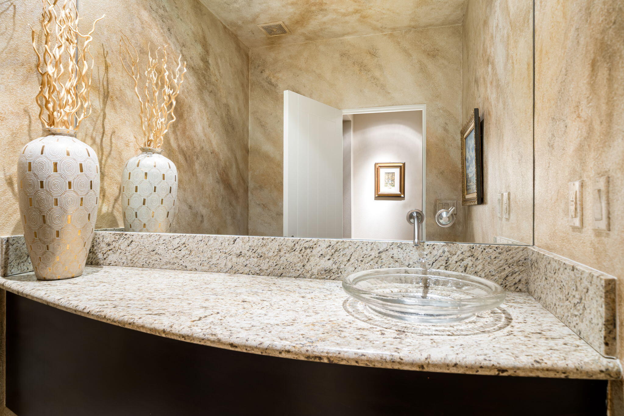 14 Dominion Court Rancho Mirage, CA 92270 - Photo 31 of 65 a bathroom with a granite countertop sink and a mirror