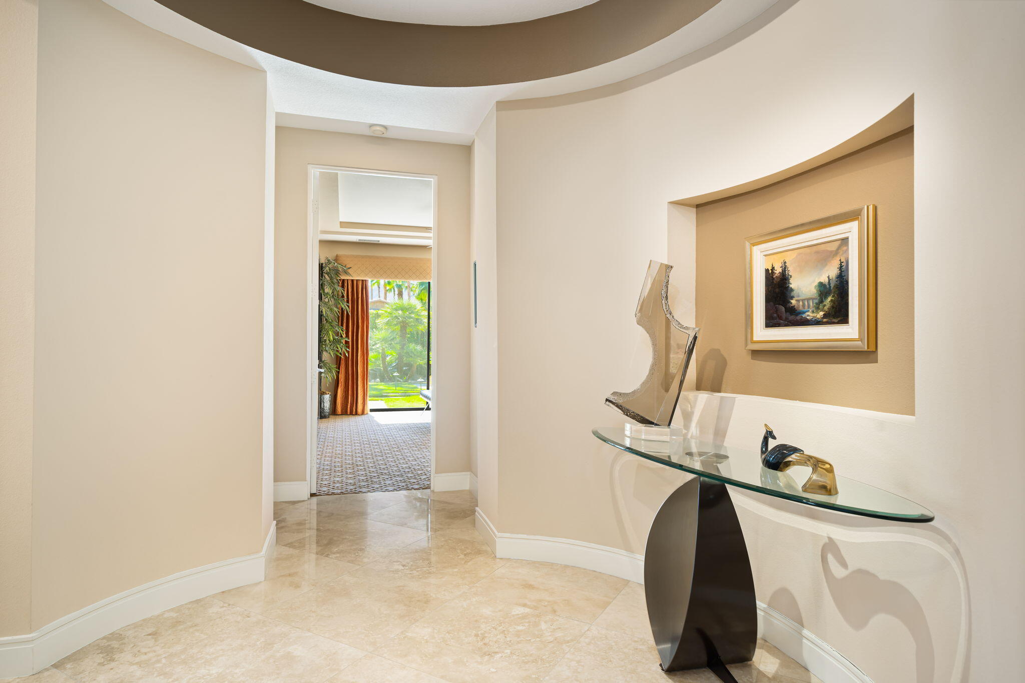 14 Dominion Court Rancho Mirage, CA 92270 - Photo 32 of 65 a view of a bedroom with bed and a window