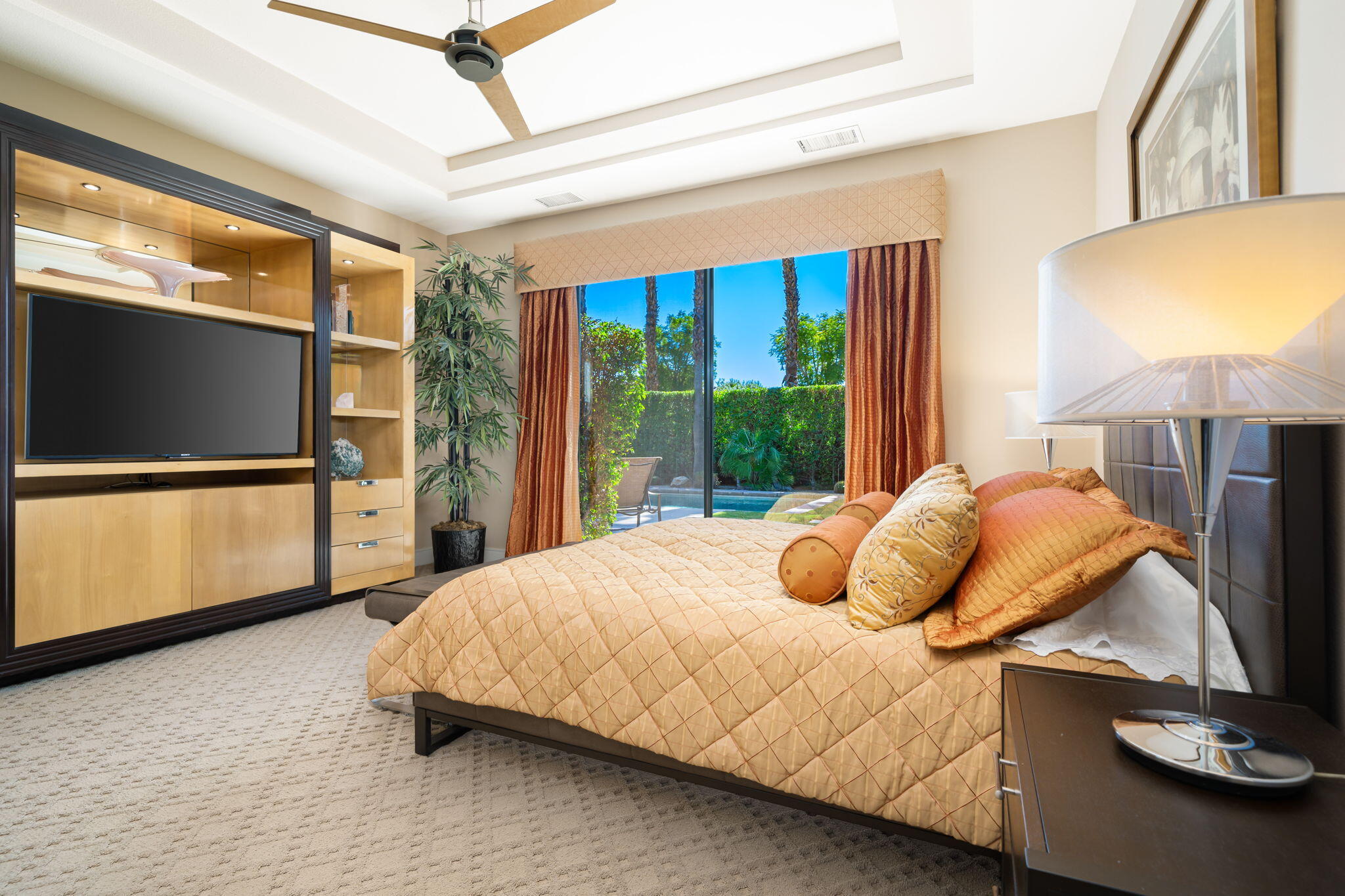 14 Dominion Court Rancho Mirage, CA 92270 - Photo 34 of 65 a bedroom with a bed and window