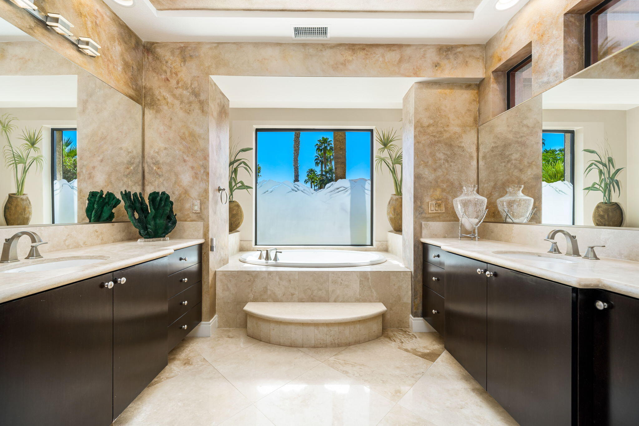 14 Dominion Court Rancho Mirage, CA 92270 - Photo 35 of 65 a bathroom with a granite countertop sink mirror bathtub and toilet