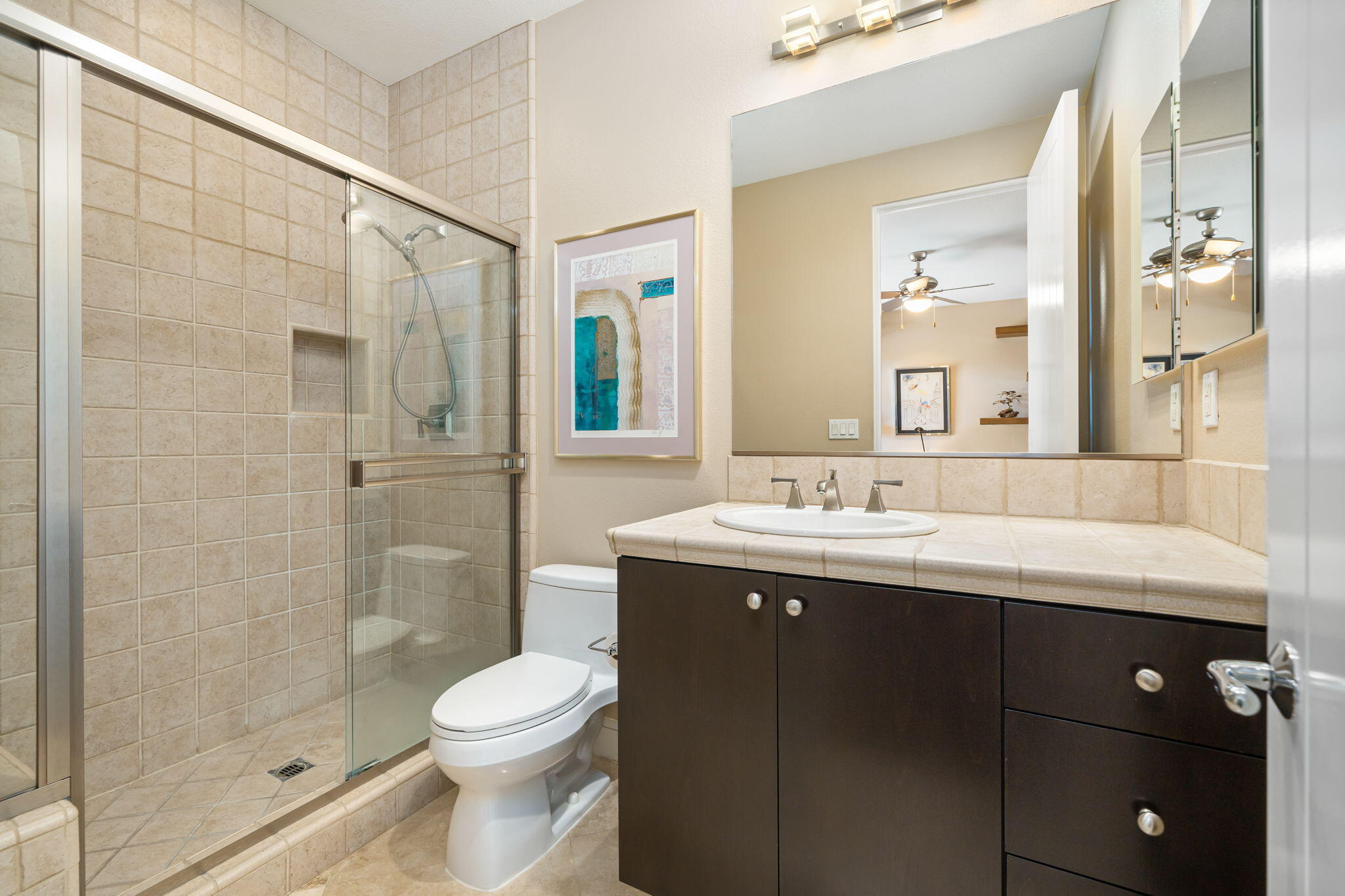 14 Dominion Court Rancho Mirage, CA 92270 - Photo 40 of 65 a bathroom with a sink a toilet and shower