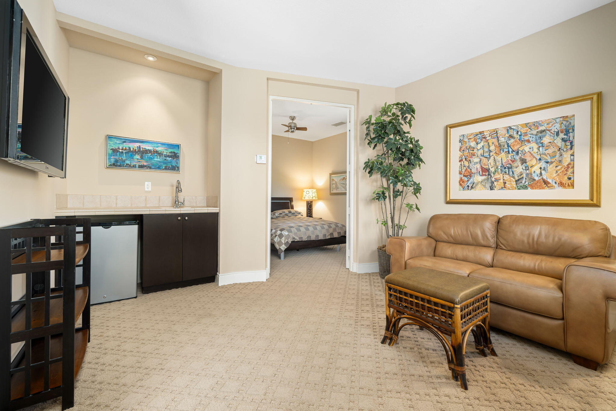 14 Dominion Court Rancho Mirage, CA 92270 - Photo 43 of 65 a living room with furniture and a flat screen tv