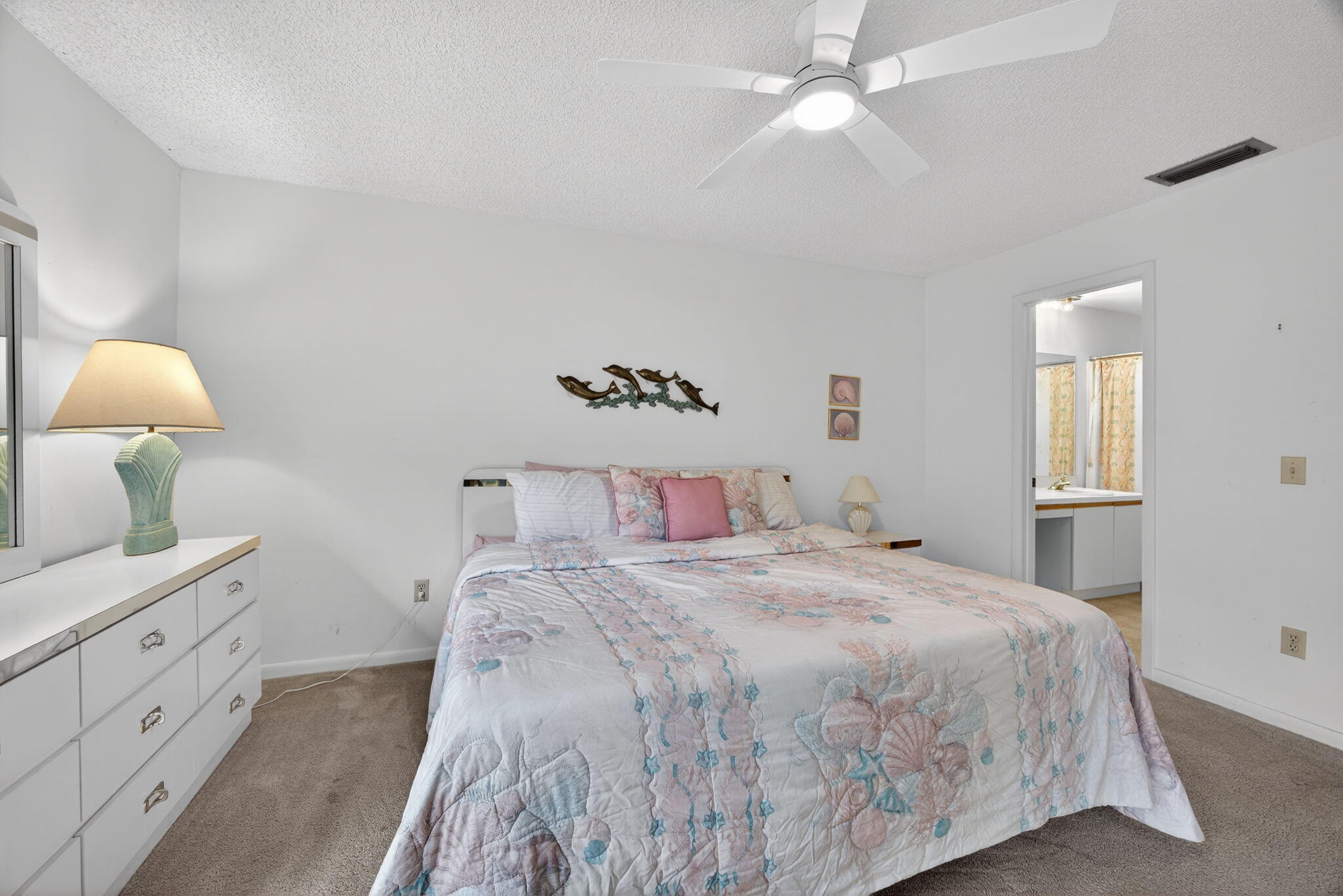 8323 Southeast Croft Circle, Unit N9 Hobe Sound, FL 33455 - Photo 16 of 66 Primary Bedroom