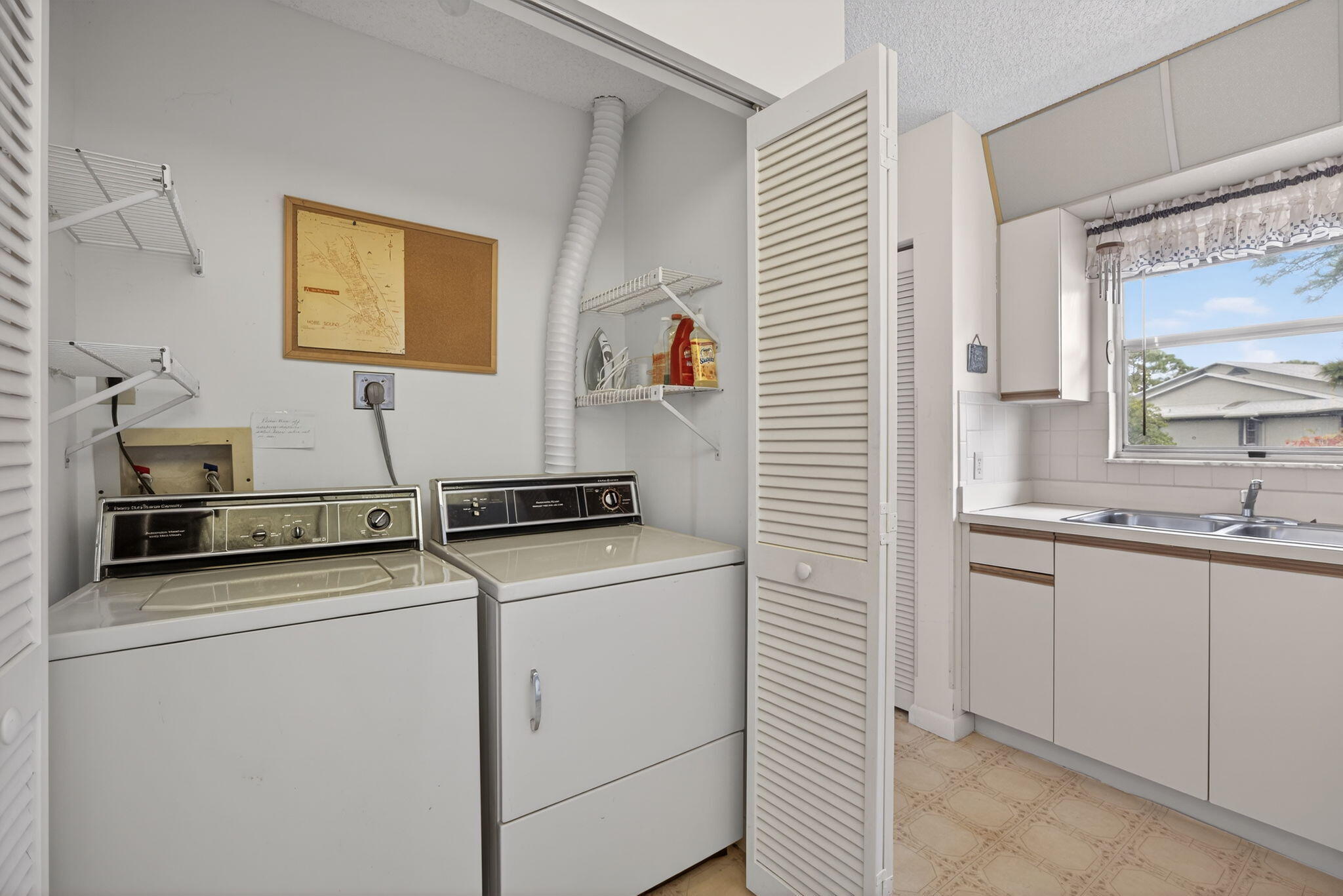 8323 Southeast Croft Circle, Unit N9 Hobe Sound, FL 33455 - Photo 25 of 66 Laundry