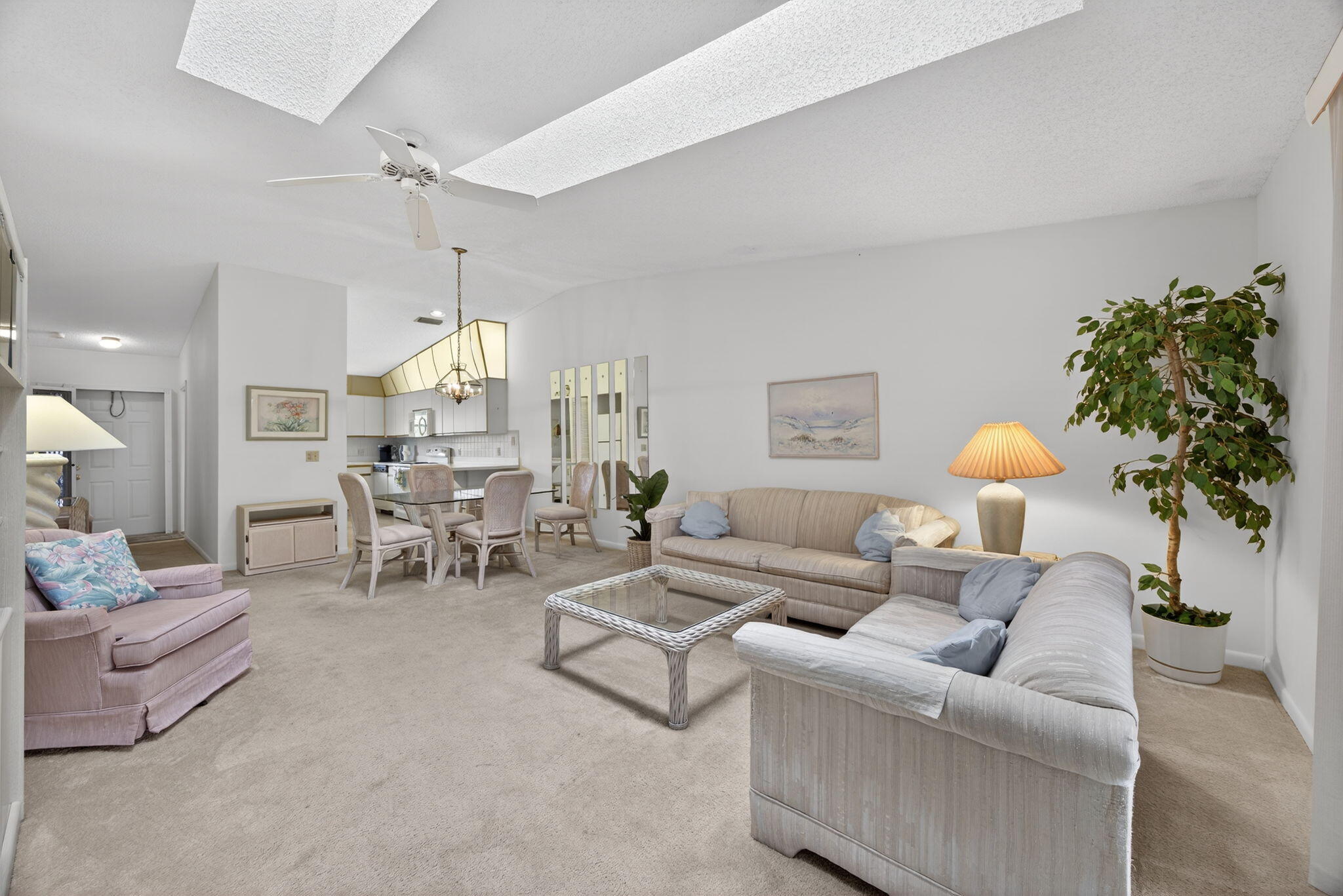 8323 Southeast Croft Circle, Unit N9 Hobe Sound, FL 33455 - Photo 10 of 66 Living Area Looking towards kitchen