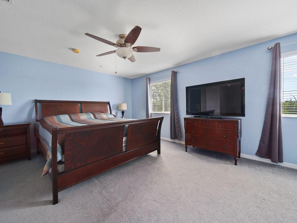 5293 Southeast Jennings Lane Stuart, FL 34997 - Photo 18 of 29 Master bedroom