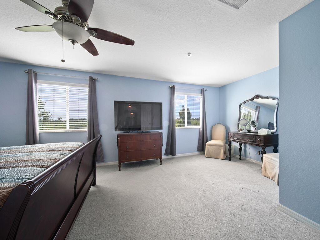 5293 Southeast Jennings Lane Stuart, FL 34997 - Photo 19 of 29 Master bedroom