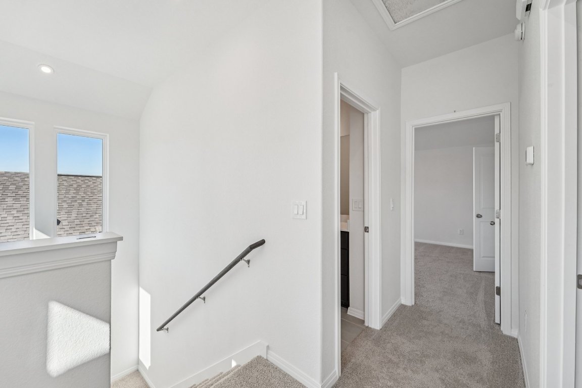 6309 Marsh Lane Buda, TX 78610 - Photo 17 of 39 a view of an entryway with wooden floor