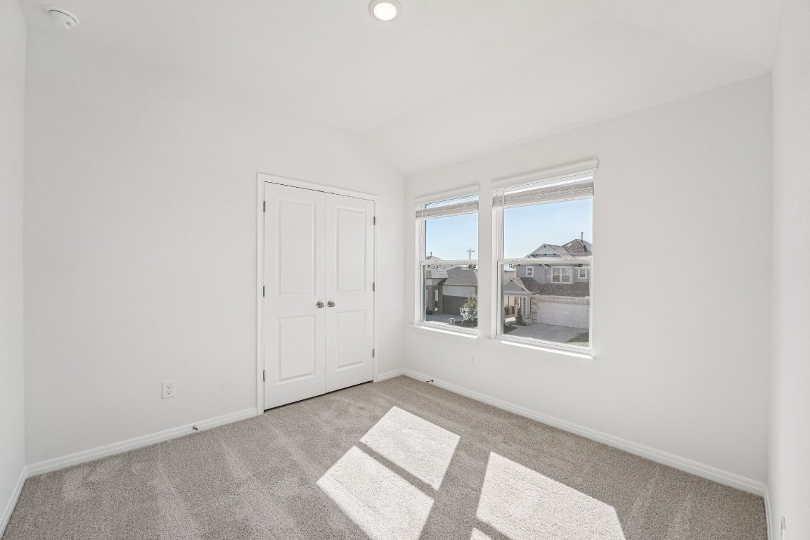 6309 Marsh Lane Buda, TX 78610 - Photo 18 of 39 an empty room with windows