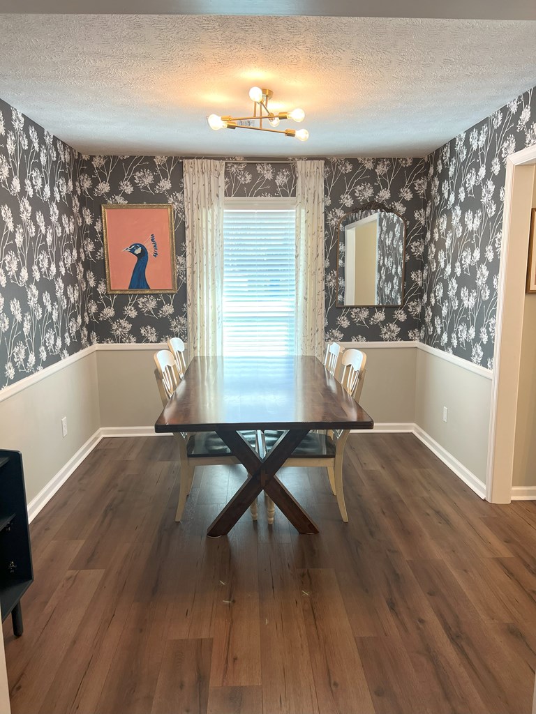 6120 Candlestick Loop Columbus, GA 31909 - Photo 6 of 20 a view of a floor to ceiling window and wooden floor