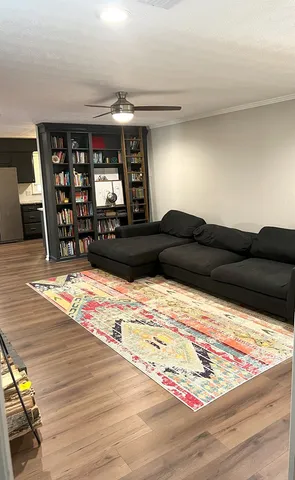 a black and white photo of a living room