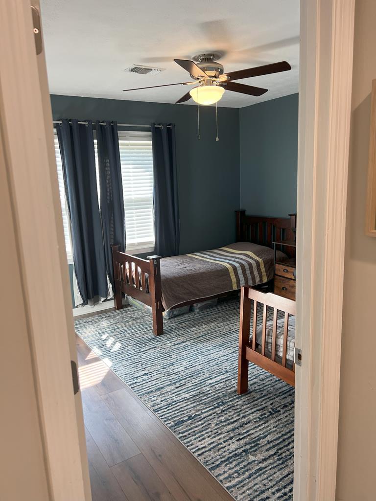 6120 Candlestick Loop Columbus, GA 31909 - Photo 9 of 20 a bedroom with furniture and a window