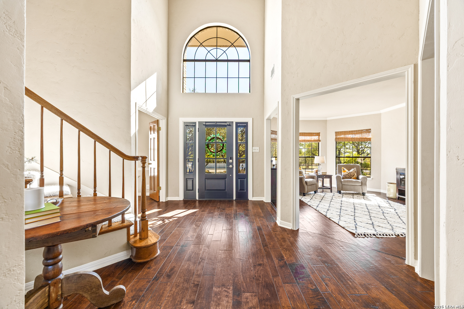 31586 Scarteen Fair Oaks Ranch, TX 78015 - Photo 13 of 67 a view of an entryway with wooden floor and a fireplace