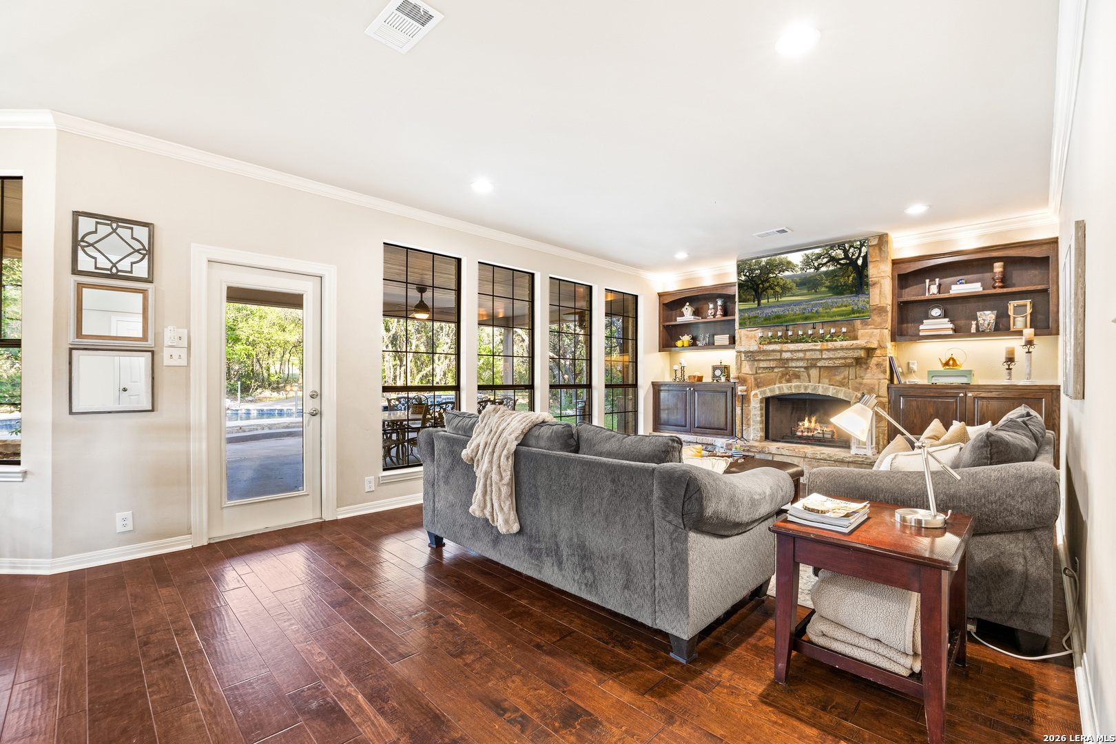 31586 Scarteen Fair Oaks Ranch, TX 78015 - Photo 18 of 67 a living room with fireplace furniture and a large window